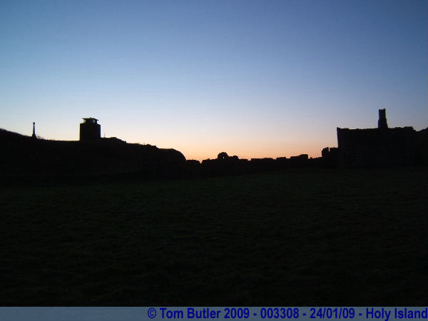 Photo ID: 003308, The sun starts to set behind the Priory, Holy Island, England