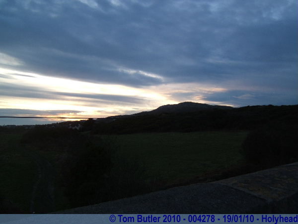 Photo ID: 004278, The sun starting to set behind Holyhead Mountain, Holyhead, Wales