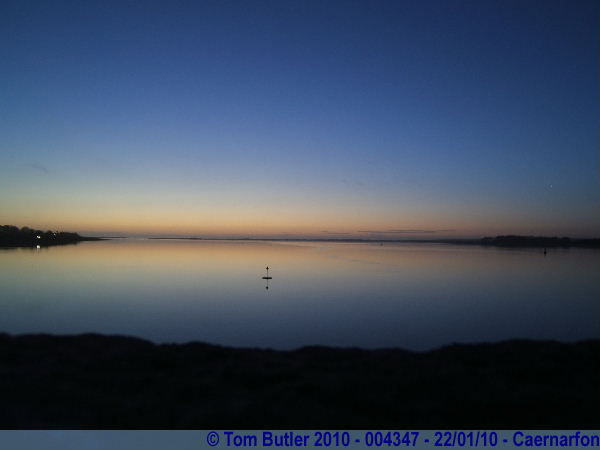 Photo ID: 004347, Looking out over the millpond still Menai Straits at dusk, Caernarfon, Wales