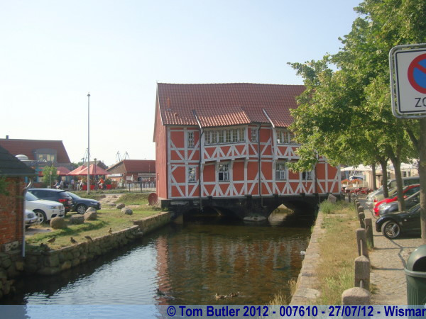 Photo ID: 007610, The Rotes Haus over the canal, Wismar, Germany