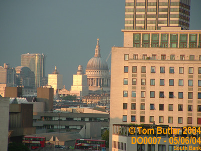Photo ID: do0007, The dome of St Pauls appearing from behind other buildings, from the London Eye, South Bank, London