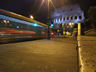 Photo ID: 001505, Busses shoot past the Colosseum (59Kb)