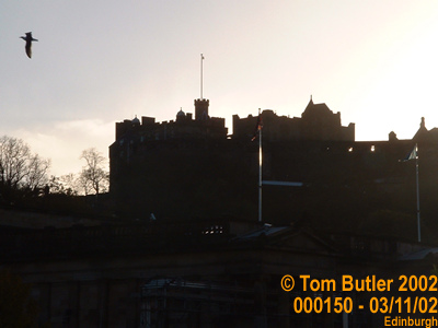Photo ID: 000150, Sun starting to go down behind the castle, Edinburgh, Scotland