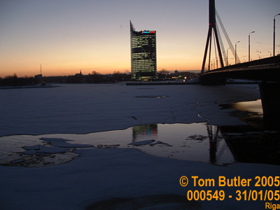 Photo ID: 000549, A frozen river Daugava slowly being broken up by a boat in the early evening, Riga, Latvia