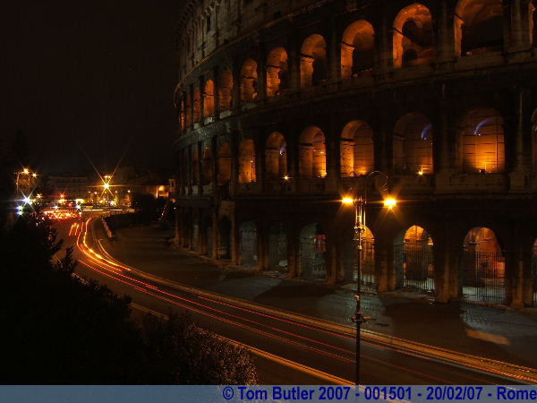 Photo ID: 001501, Rome's traffic speeds past it's most famous monument, Rome, Italy