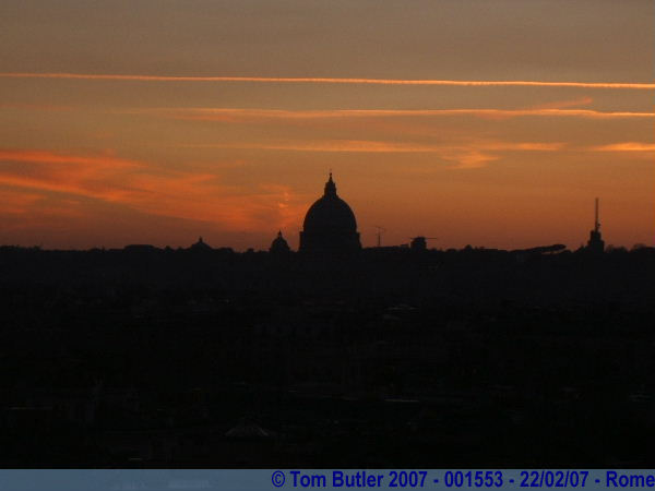 Photo ID: 001553, The sun goes down behind St Peters, Rome, Italy