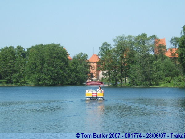 Photo ID: 001774, A boat cruises across to the island castle, Trakai, Lithuania