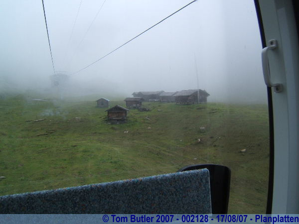 Photo ID: 002128, Small huts, appear out of the mists, Planplatten, Switzerland