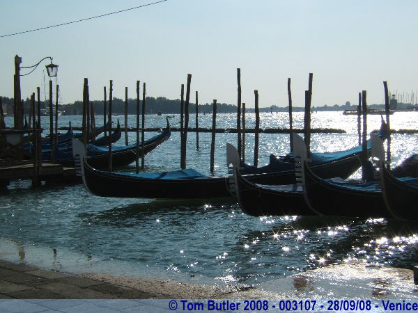 Photo ID: 003107, Gondolas lined up in front of St Marks, Venice, Italy