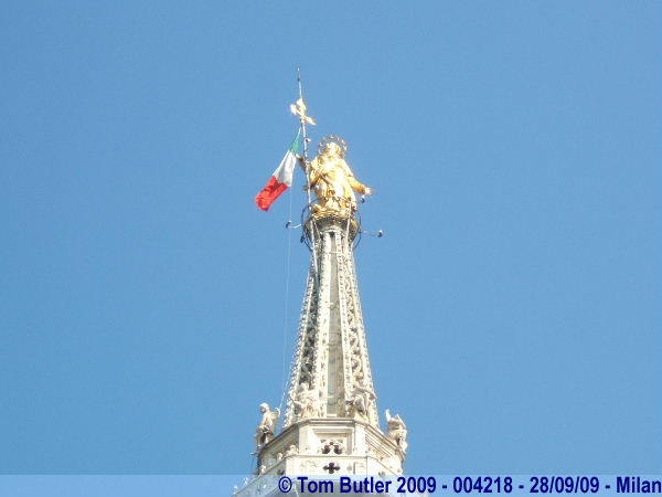 Photo ID: 004218, The golden statue of La Madonnina on the top of the Duomo, Milan, Italy