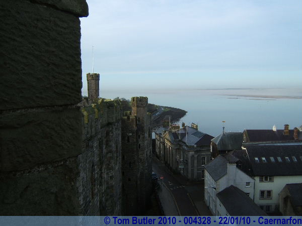 Photo ID: 004328, Looking out over the millpond still Menai Straits and mist patches from Caernarfon castle, Caernarfon, Wales