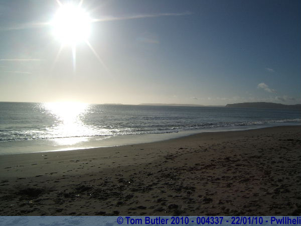 Photo ID: 004337, A bright January sun shines down on the clear sea and sandy beach, it could be the Caribbean, if it weren't for the temperature, Pwllheli, Wales
