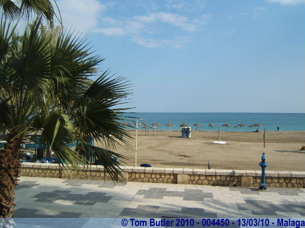 Photo ID: 004450, The typical view of Malaga, Blue sky, Blue sea, sandy beach and palm umbrella's, Malaga, Spain