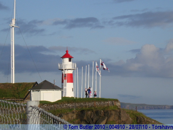 Photo ID: 004910, The flags being taken down at the end of the first day of National Day Celebrations, Trshavn, Faroe Islands