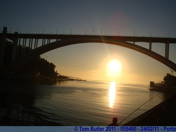 Photo ID: 005490, The sun starts to set underneath the Ponte de Arrbida, Porto, Portugal