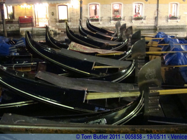 Photo ID: 005858, A fleet of Gondoliers moored up behind St Marks Square, Venice, Italy