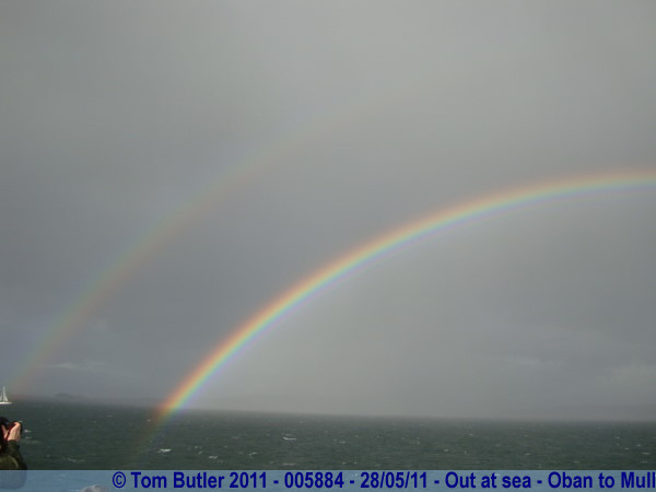 Photo ID: 005884, A double rainbow starts to form off the stern, Out at sea - Oban to Mull, Scotland