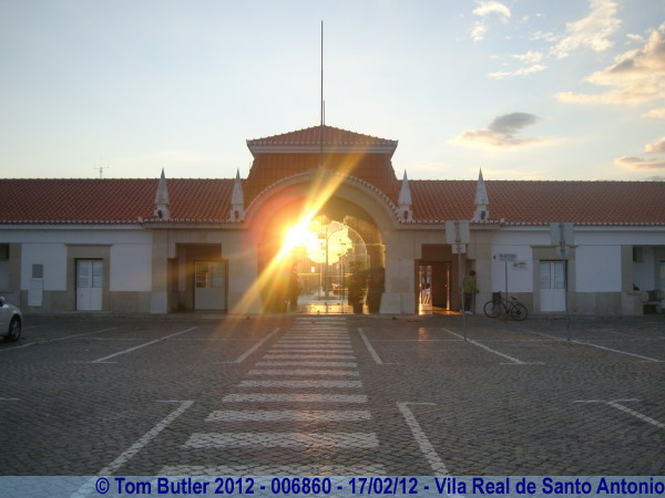 Photo ID: 006860, The setting sun shines through the customs house, Vila Real de Santo Antonio, Portugal