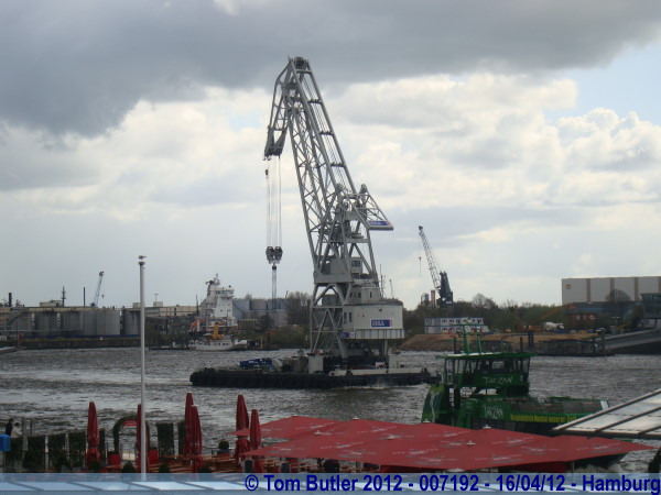 Photo ID: 007192, A crane sails down the Elbe, Hamburg, Germany