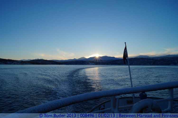 Photo ID: 008496, The sun starts to clear the mountains, On the Hurtigruten between Harstad and Finnsnes, Norway