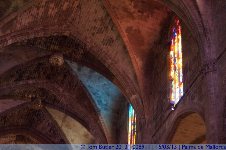 Photo ID: 008911, Stained glass illuminating the stone ceiling, Palma de Mallorca, Spain