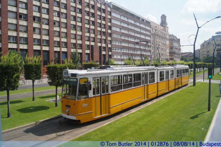 Photo ID: 012876, A tram passes the sightseeing bus, Budapest, Hungary