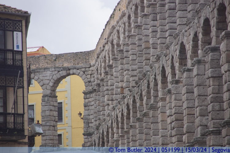 Photo ID: 051199, The Aqueduct makes its final turn before the city centre, Segovia, Spain