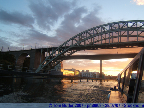 Photo ID: pm0903, Passing underneath the bridges over Lake Mlaren at dusk, Stockholm, Sweden